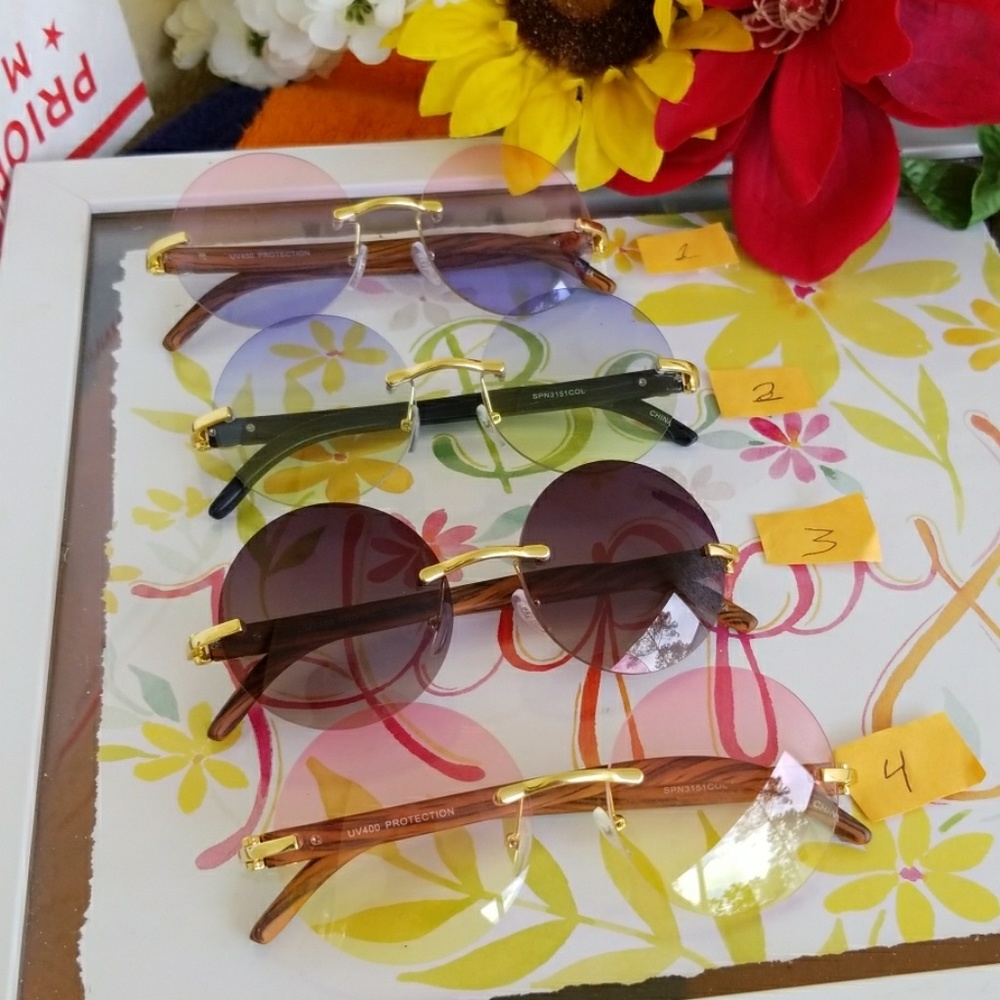 Men Women No Frame Round Sunglasses Shades UV400 - Picture 1 of 8